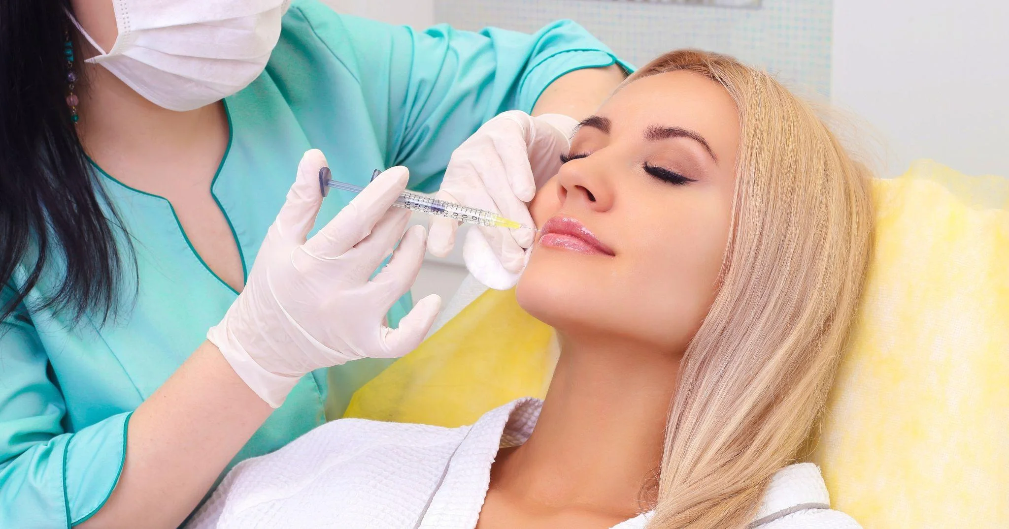 Clinician administering a dermal filler treatment